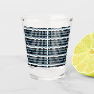 a black and white chequered pattern with a white b shot glass