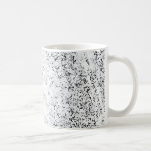 A black and white grainy texture background coffee mug
