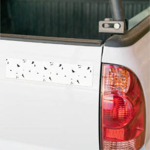 a black and white photo of a flock of birds bumper sticker