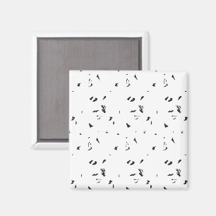 a black and white photo of a flock of birds magnet