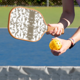 a black and white photo of a pattern pickleball paddle