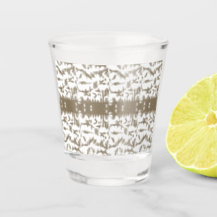 a black and white photo of a pattern shot glass