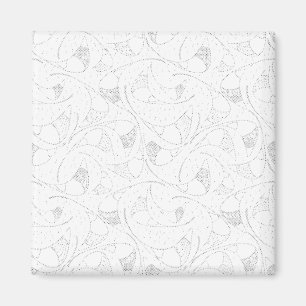 a black and white photo of a person holding a cell magnet