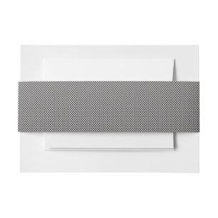 a black and white photo of a wall_ invitation belly band