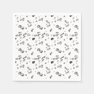 a black and white photo of bubbles on a white back napkin