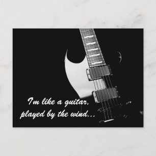 A black guitar postcard