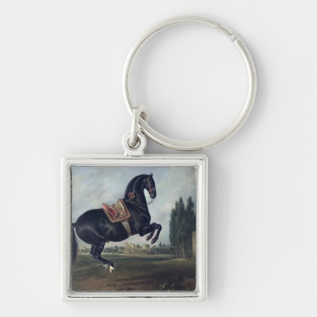 A black horse performing the Courbette Key Ring (Front)