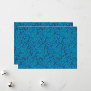 a blue and black background with a pattern holiday card