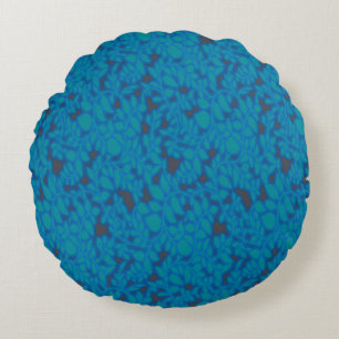 a blue and black background with a pattern round cushion