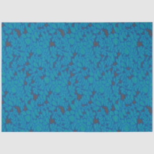 a blue and black background with a pattern tissue paper