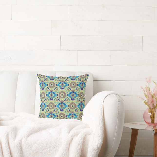 a blue and green pattern on a green background cushion (Couch)