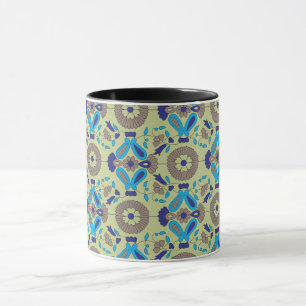 a blue and green pattern on a green background mug
