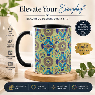 a blue and green pattern on a green background mug