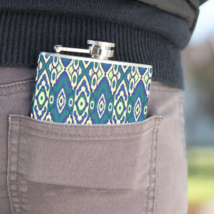 a blue and green pattern with a white background hip flask