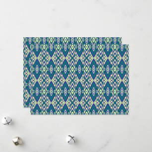 a blue and green pattern with a white background holiday card