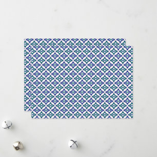 a blue and green pattern with a white background holiday card