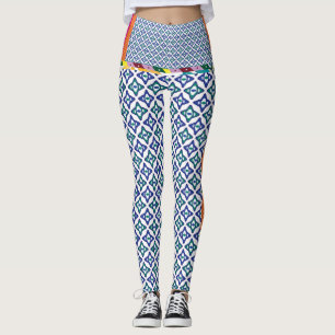 a blue and green pattern with a white background leggings