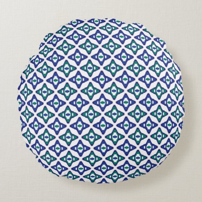 a blue and green pattern with a white background round cushion (Front)