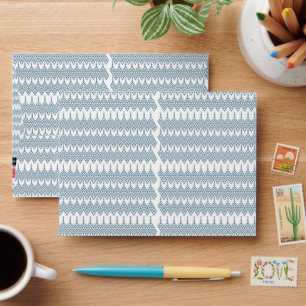 a blue and white pattern with a white background envelope