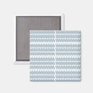 a blue and white pattern with a white background magnet