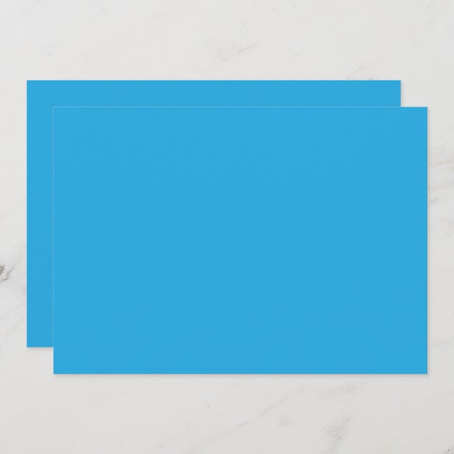 a blue background with a black and white cat on to invitation (Front/Back)