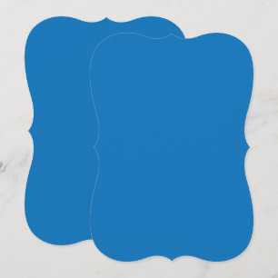 a blue background with a black and white clock