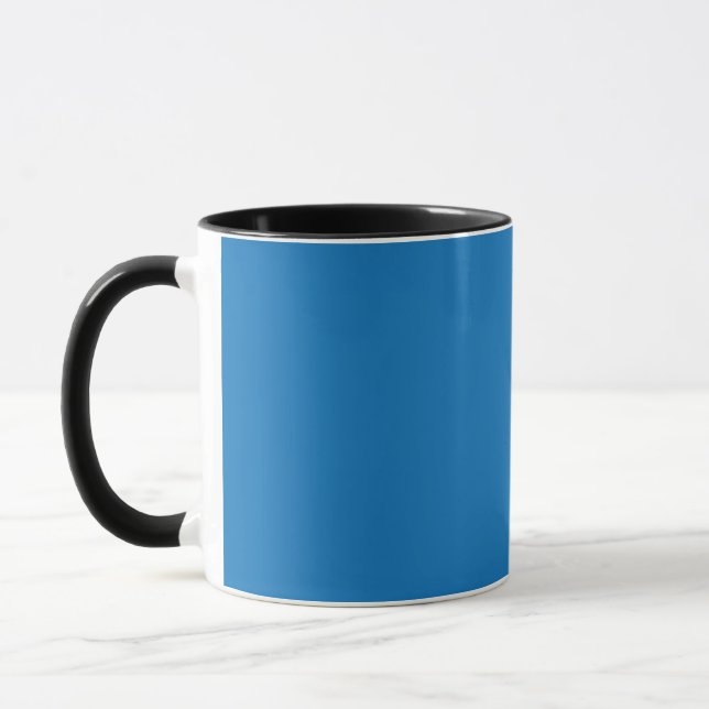a blue background with a black and white clock mug (Left)