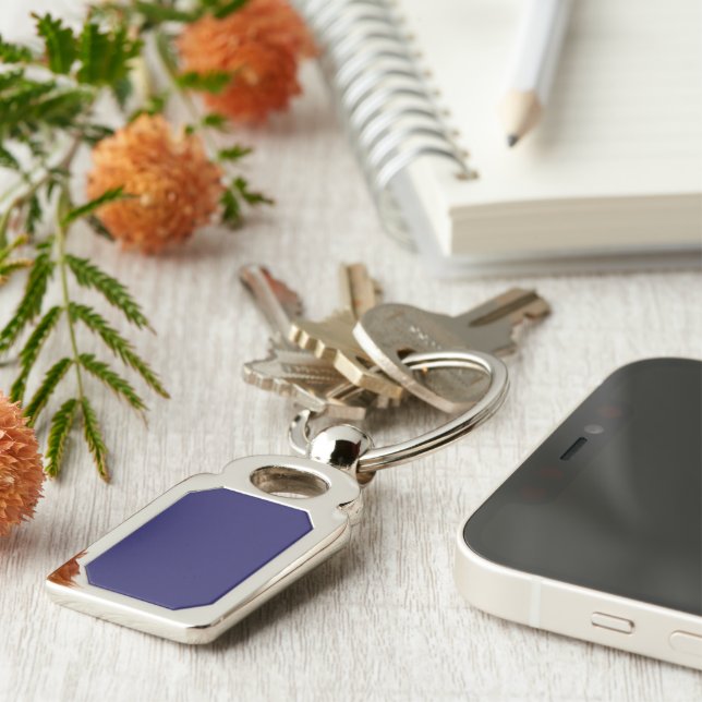 a blue background with a clock on it key ring (Side)