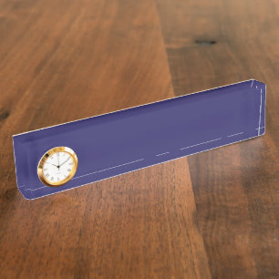 a blue background with a clock on it nameplate