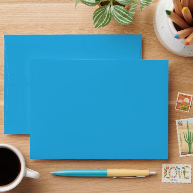 a blue background with a envelope (Desk)
