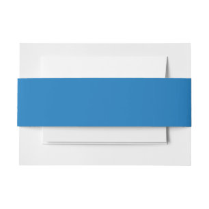 a blue background with a invitation belly band