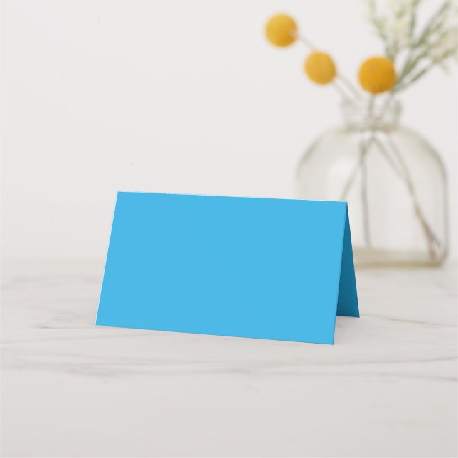 a blue background with a place card (Front)