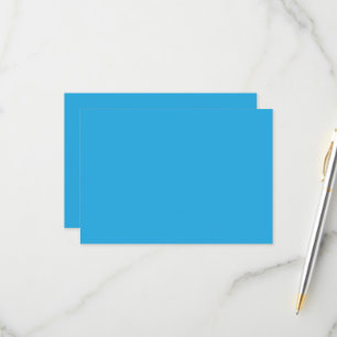 a blue background with a RSVP card