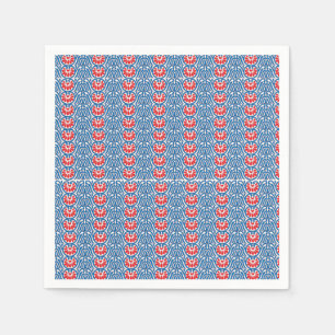 a blue background with red and white designs napkin