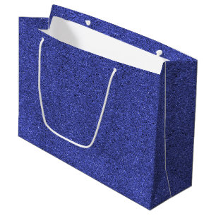 A blue glittery gift bag with white handles