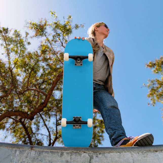 a blue sky with a plane flying in the sky skateboard (Outdoor 1)