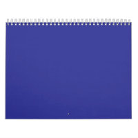 a blue wall with a clock