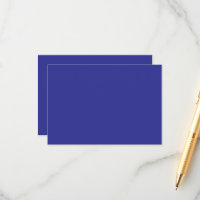 a blue wall with a clock