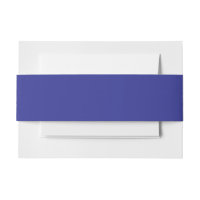 a blue wall with a clock