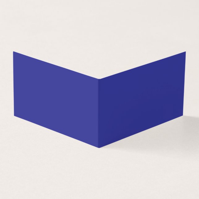 a blue wall with a clock on it (Outside)