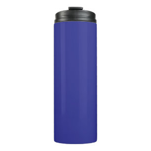 a blue wall with a clock on it thermal tumbler