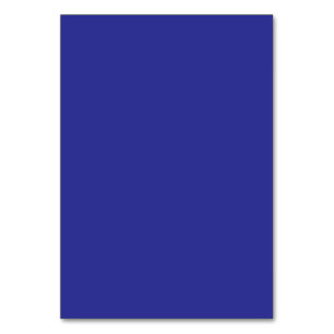 a blue wall with a clock table number