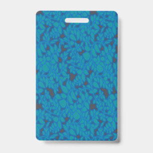 A blue wrapping paper with a creative arts pattern ID badge