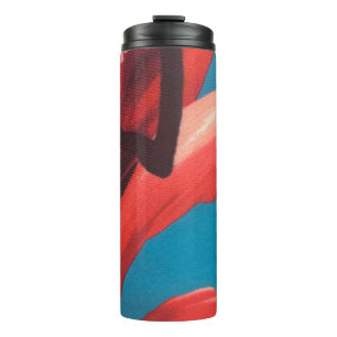 A bold and colorful floral print thermal tumbler