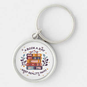 A book a day keep reality away key ring