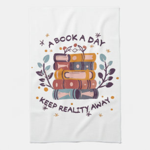 A book a day keep reality away tea towel