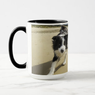 A Border Collie Dog Running On The Beach Mug