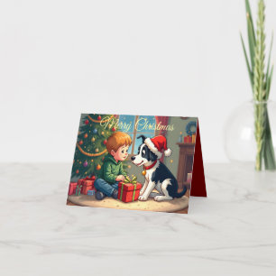 A boy and his dog opening Christmas gifts Holiday Card