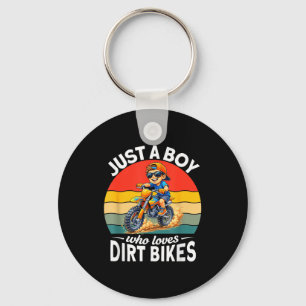 A boy who loves dirt bikes motocross enduro kids key ring