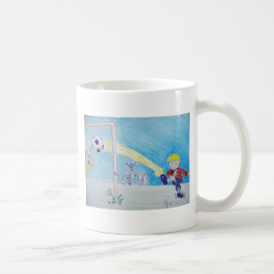 A boy's first goal playing football coffee mug